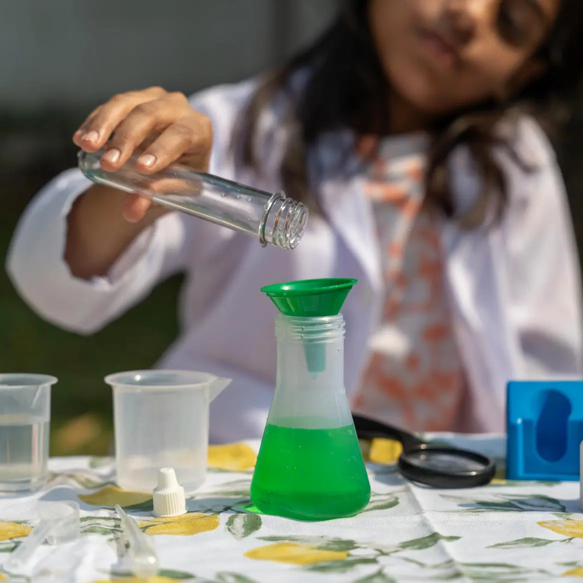 Child performing hands-on experiments with the Nesta Toys Junior Chemistry Lab Kit