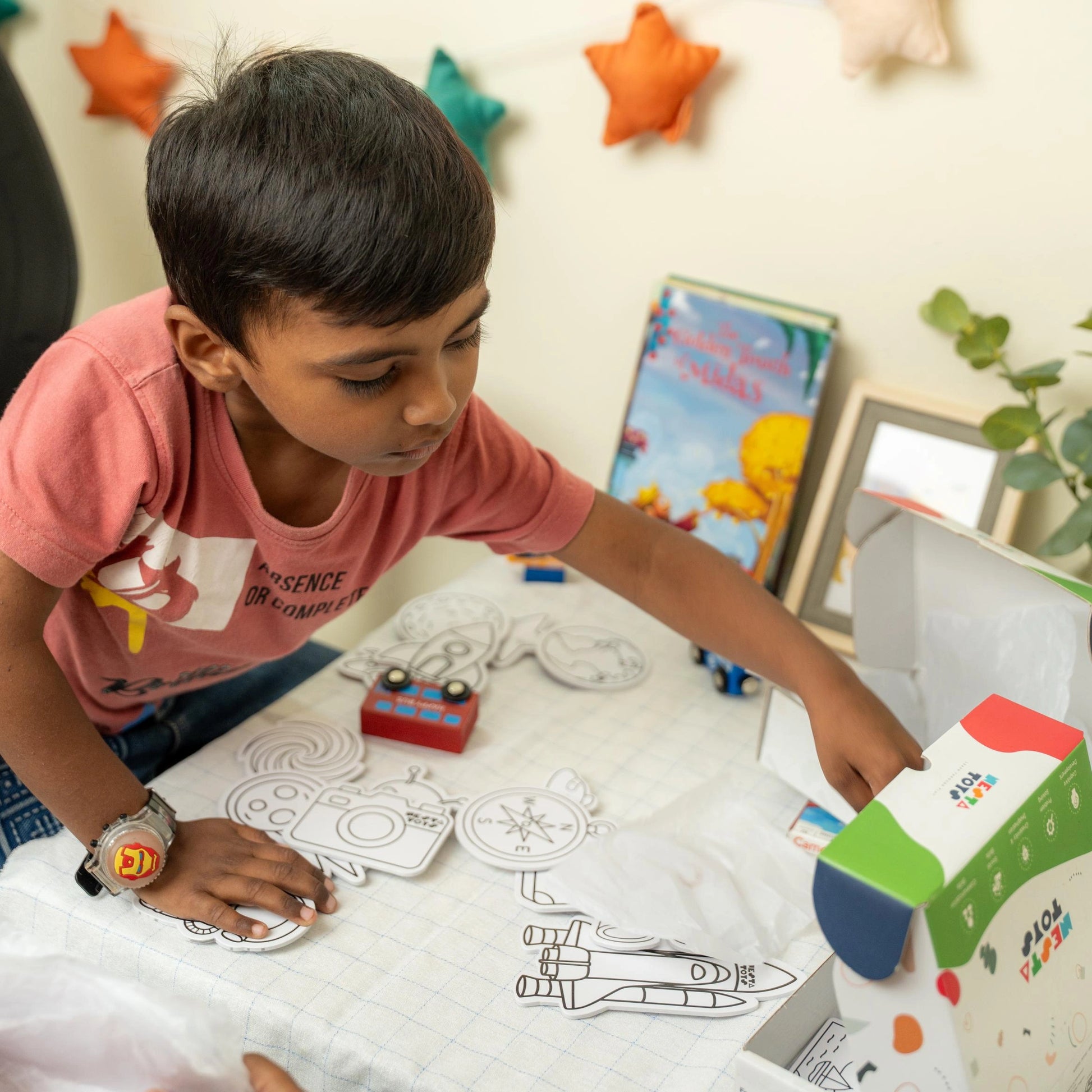 Kid coloring space themed fridge magnets from Nesta Toys